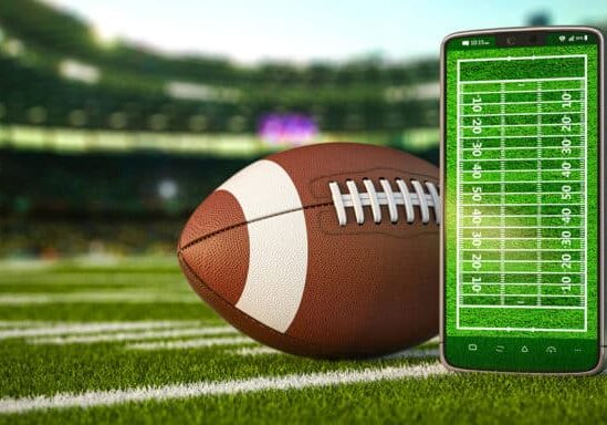 American football app video game on smartphone and betting sport online concept. Mobile phone and american football ball. 3d illustration